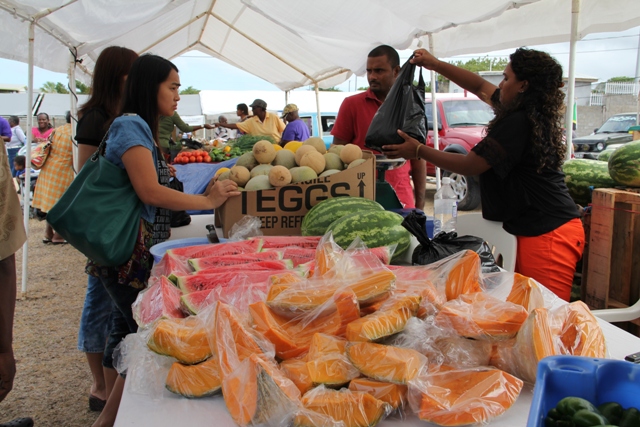 An abundance of locally grown fruits and vegetables on sale by farmers at the Agriculture Open Day on Nevis (file photo)
